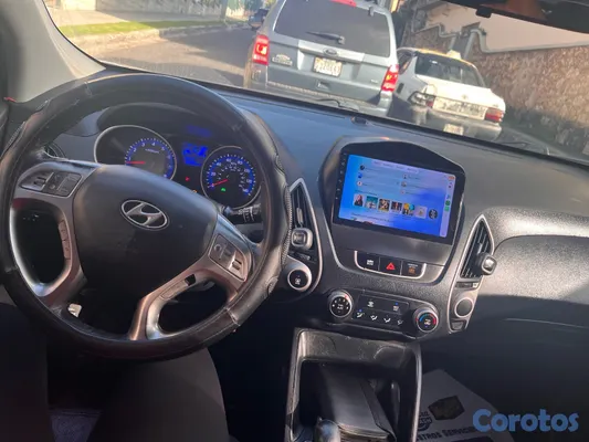 jeepetas y camionetas - Hyundai Tucson 2012 en excelente condición — RD$699,000 negociable D.N. 4