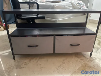 mueble de televisor con cajones  en tela.  