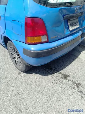 carros - vendo como honda logo chocado, daños menores  3