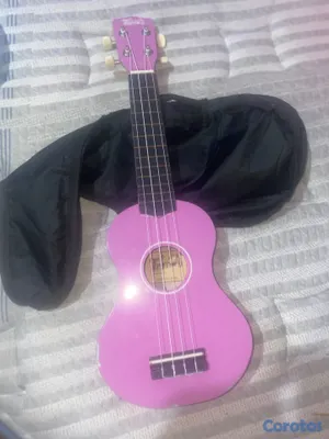 instrumentos musicales - VENDO UQUELELE, Y RAQUETA PROFESIOANL DE TENNIS.  15