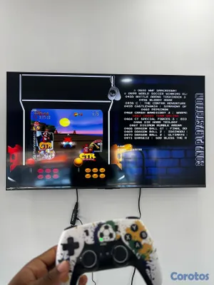 consolas y videojuegos - Gamestick x8 ultra con 2 controles recargables y más de 40 mil juegos  5